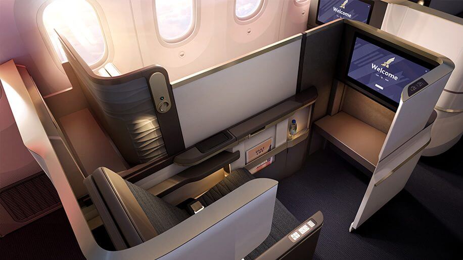 an airplane with a tv and a chair