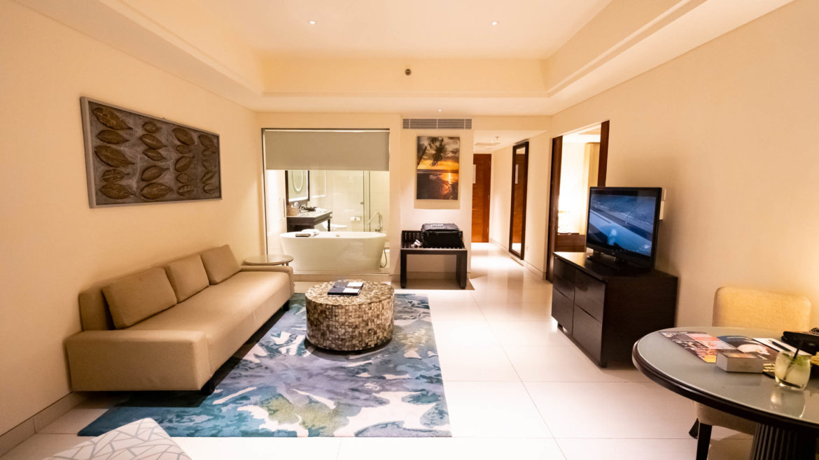 a living room with a television and a couch