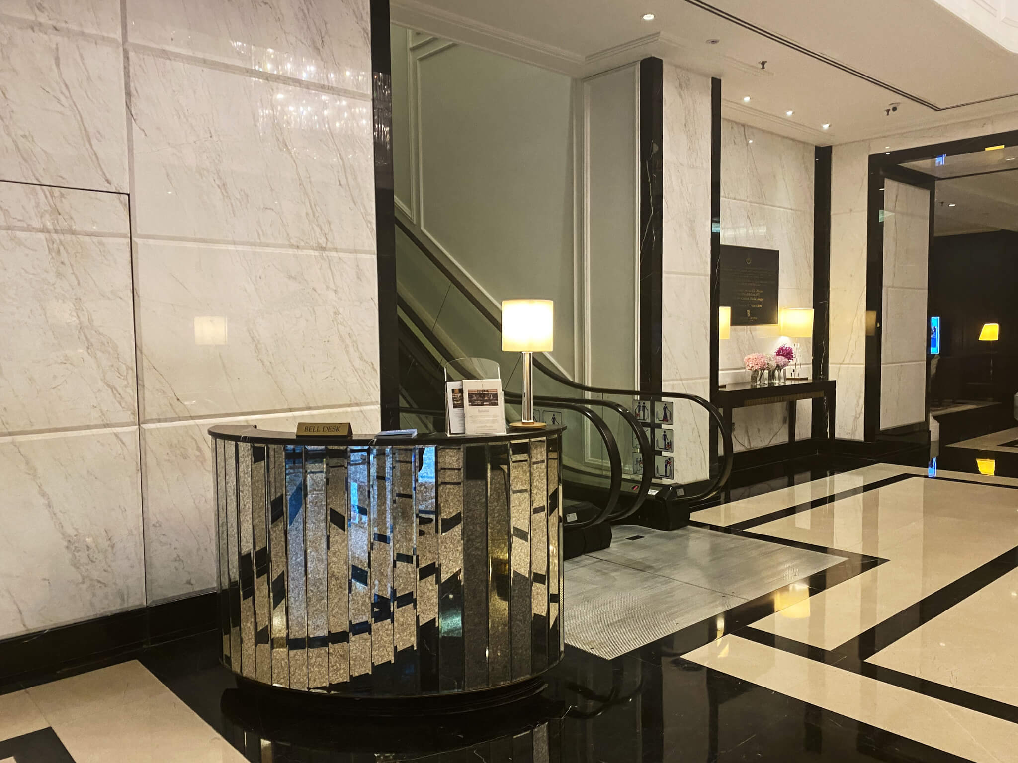 a reception desk in a hotel lobby