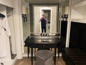 a man taking a selfie in a mirror