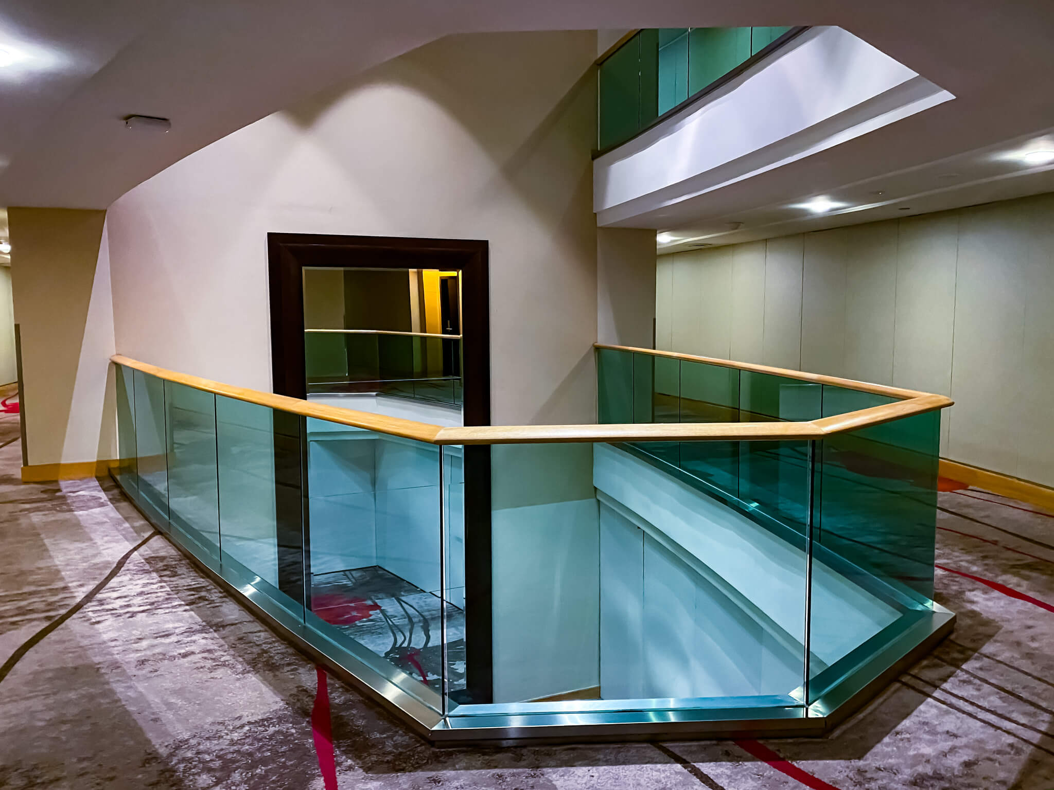 a glass railing in a building