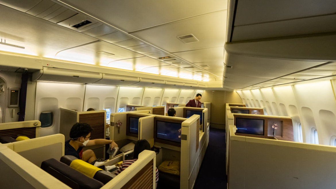 TG F_-14 people in an airplane with a man and a woman sitting on the seats