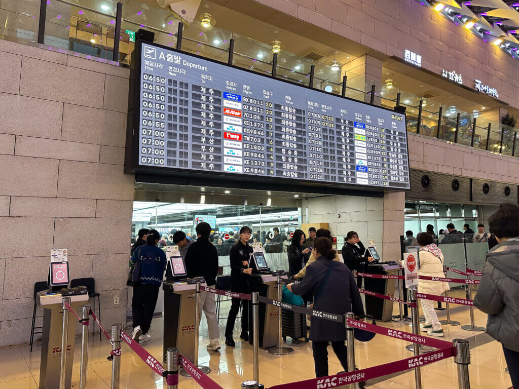 a group of people in a terminal