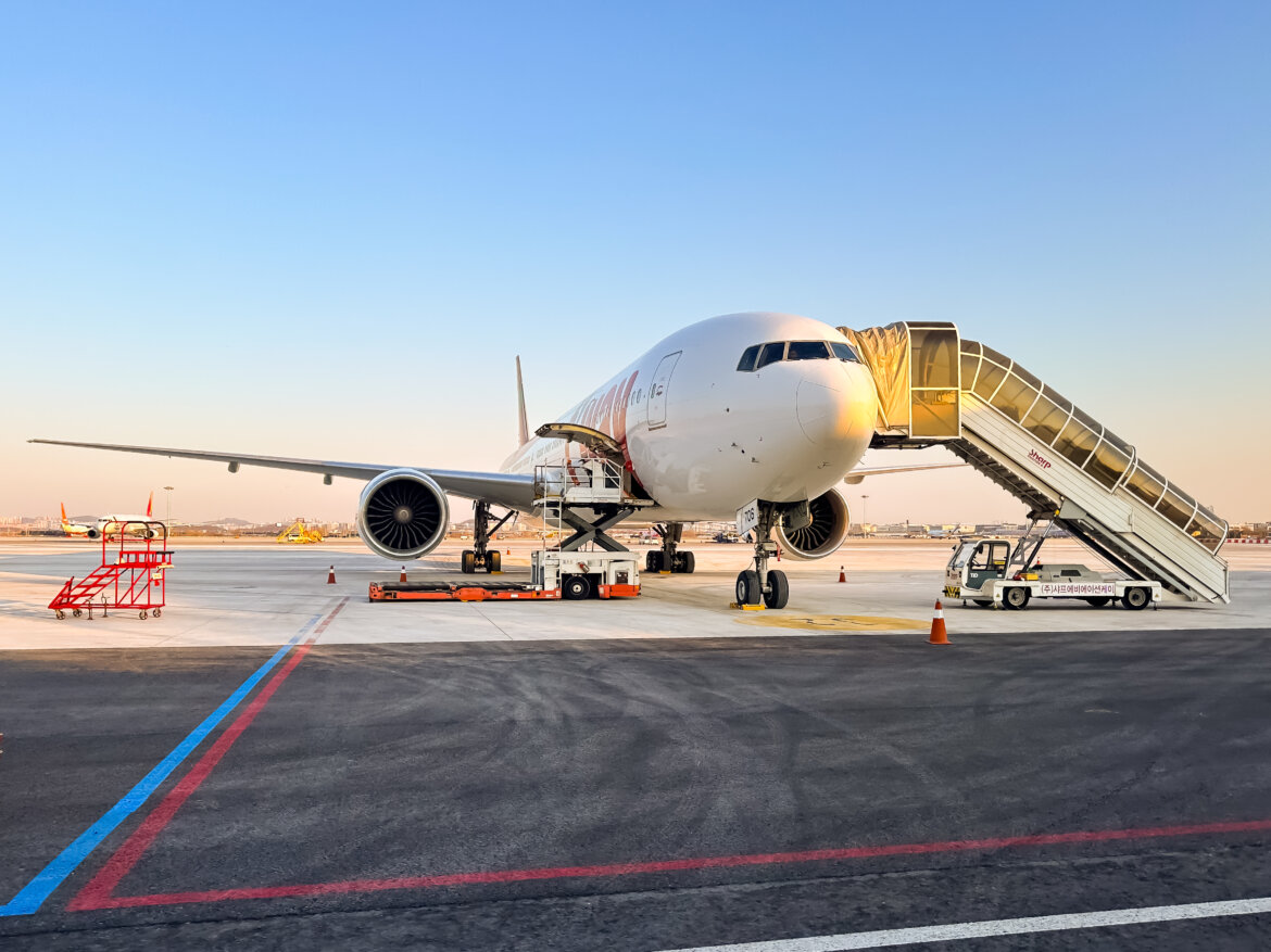 a plane with a staircase on the side